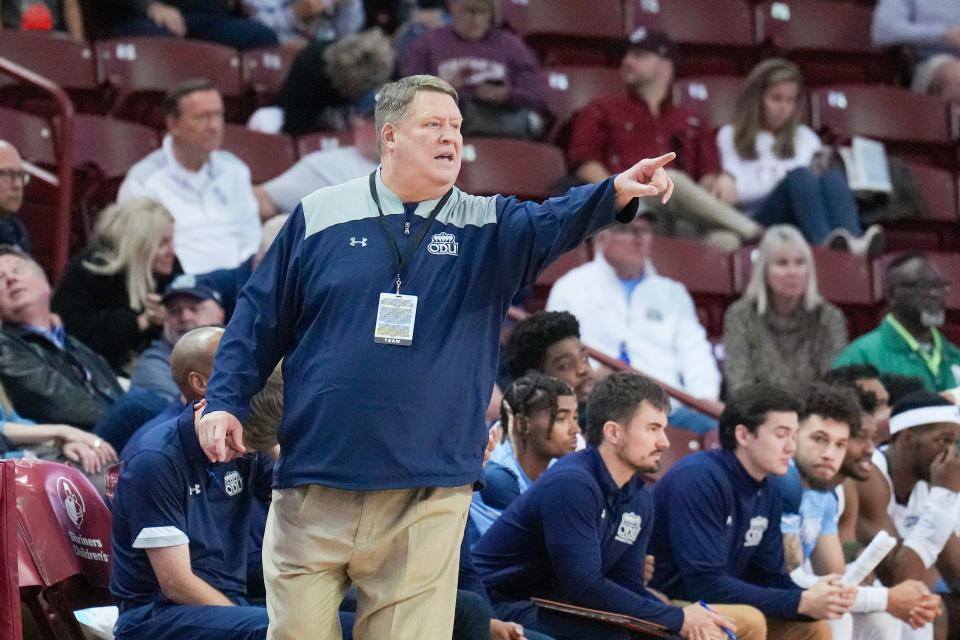 Old Dominion Monarchs head coach Jeff Jones shouts instructions to his players in the second half against the Furman Paladins at TD Arena.