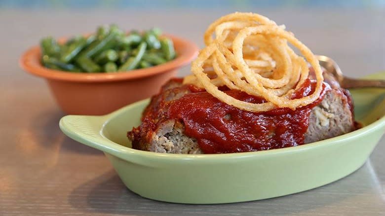 green beans and meatloaf topped with tobacco onions