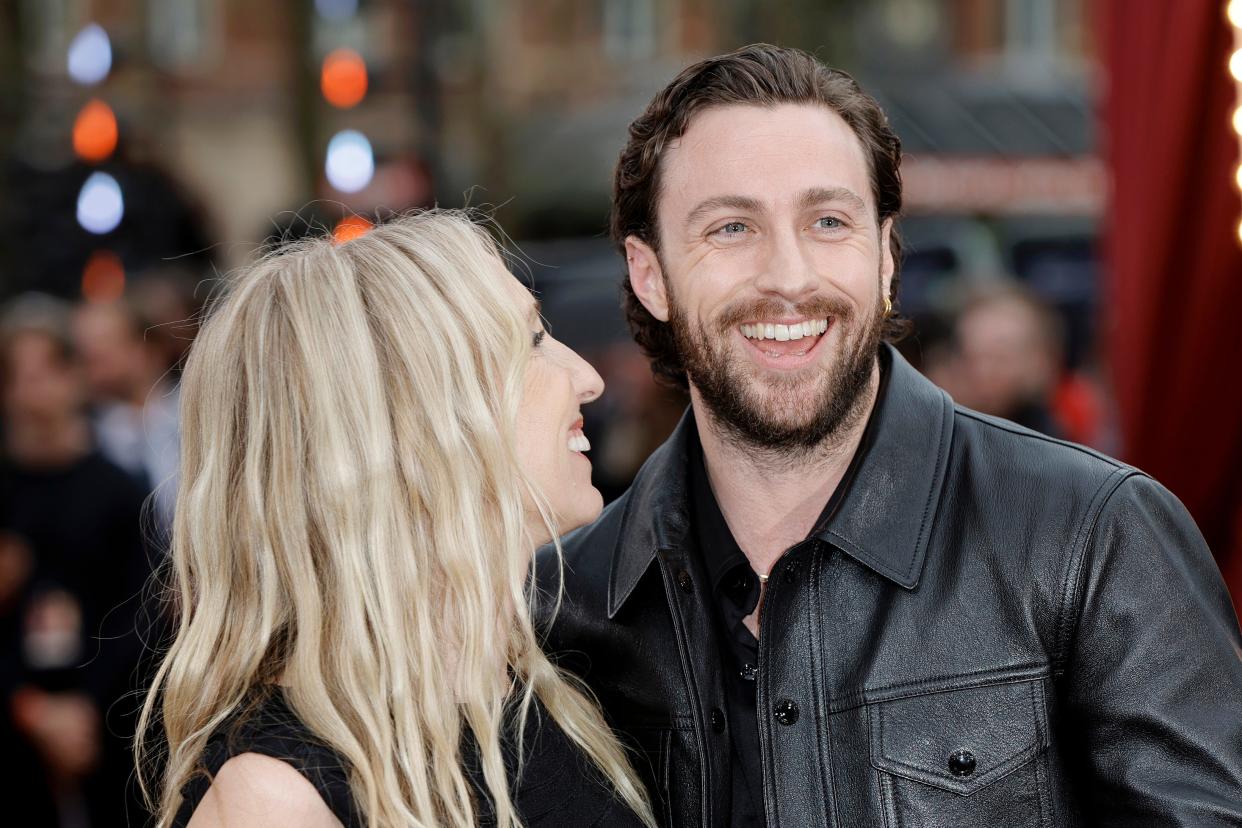 Sam Taylor-Johnson and Aaron Taylor-Johnson (right) attend the world premiere of "Back To Black" at the Odeon Luxe Leicester Square on April 08, 2024 in London, England.