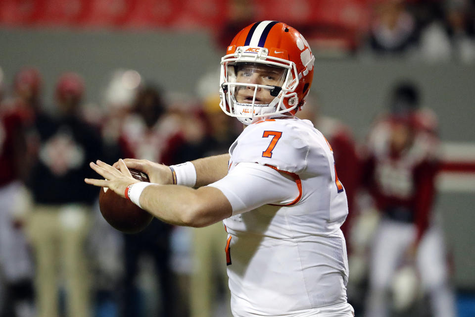 Clemson's Chase Brice (7) passes the ball against North Carolina State during the second half of an NCAA college football game in Raleigh, N.C., Saturday, Nov. 9, 2019. (AP Photo/Karl B DeBlaker)