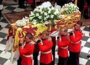 <p>The funeral of Princess Diana was, just like her marriage to Prince Charles, a global spectacle that saw 2.5 billion people watching along. According to the <a rel="nofollow noopener" href="http://www.mirror.co.uk/news/uk-news/princess-dianas-funeral-how-secrets-10507016" target="_blank" data-ylk="slk:Mirror UK;elm:context_link;itc:0;sec:content-canvas" class="link "><em>Mirror UK</em></a> , Diana’s body was enclosed inside a 700 lbs. lead lined coffin and following the public funeral she was laid to rest in a private ceremony at the Althorp Estate. <em>The Sun</em> <a rel="nofollow noopener" href="https://www.thesun.co.uk/news/4110467/princess-diana-grave-althorp-estate-spencer/" target="_blank" data-ylk="slk:details;elm:context_link;itc:0;sec:content-canvas" class="link ">details</a> the burial site as “located on an island in the middle of an ornamental lake on the estate.” The Spencer family has owned the Althorp Estate since 1508. </p>