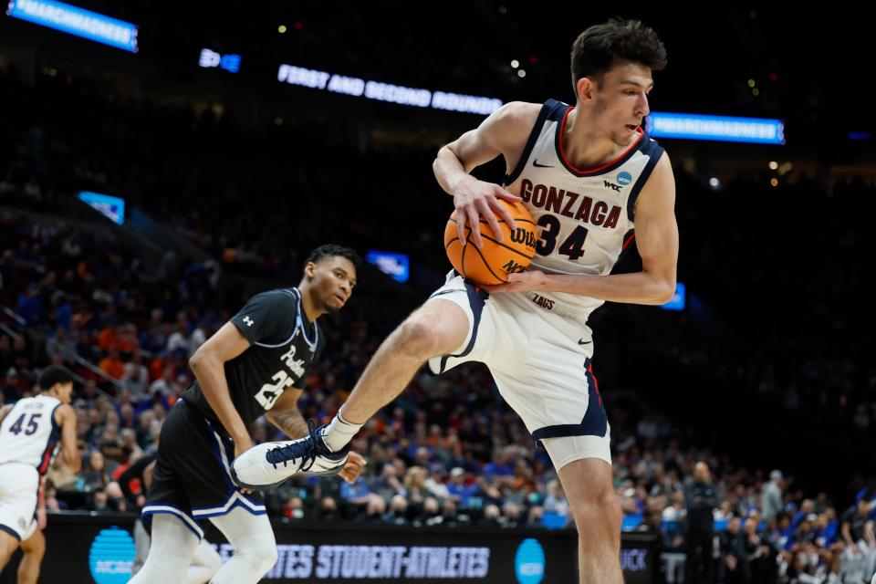 Gonzaga center Chet Holmgren (34) controls a rebound in the first half against Georgia State during the first round of the 2022 NCAA Tournament at Moda Center in Portland, Oregon.