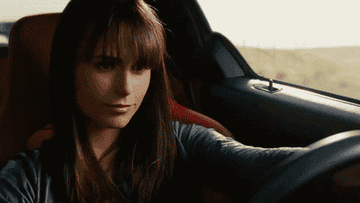 Jordana Brewster as Mia in Fast & Furious drive a car