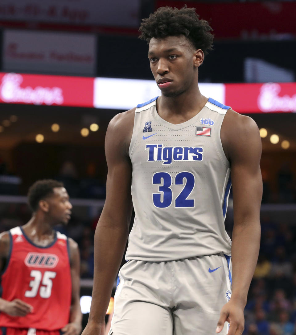Memphis James Wiseman (32) take his position on the floor between plays iduring the second half of an NCAA college basketball game against Illinois-Central Friday, Nov. 8, 2019, in Memphis, Tenn. (AP Photo/Karen Pulfer Focht)