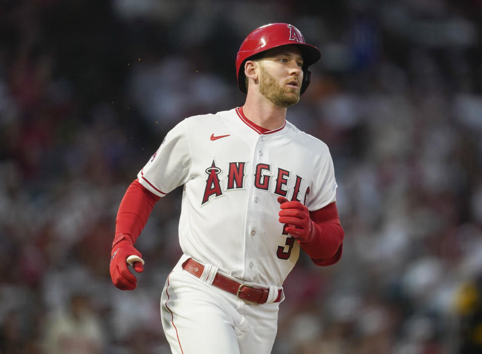 FILE - Los Angeles Angels left fielder Taylor Ward (3) singles during the fifth inning of a baseball game against the Houston Astros, Friday, July 14, 2023, in Anaheim, Calif. Outfielder Taylor Ward argued his case with the Los Angeles Angels on Friday, Feb. 2, 2024, asking for a raise from $2.75 million to $4.8 million while the team argued for $4.3 million. A decision by Jeanne Vonhof, Margaret Brogan and Jasbir Parmer is expected next week.(AP Photo/Ryan Sun, File)