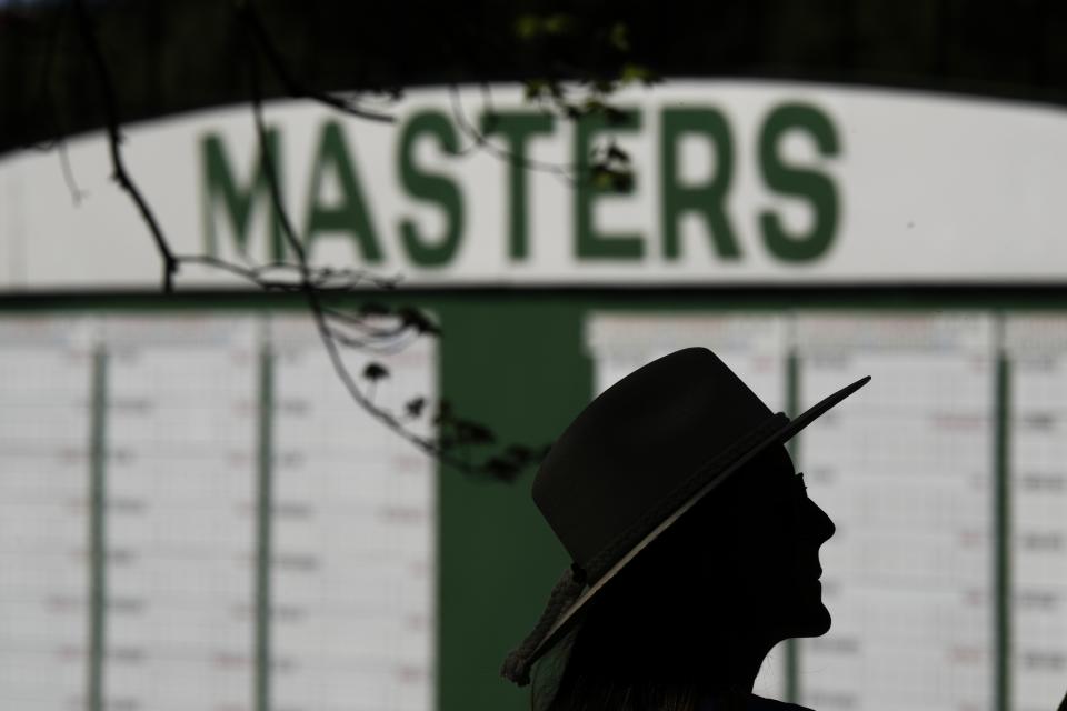 A patrons watches during a practice round in preparation for the Masters golf tournament at Augusta National Golf Club Sunday, April 7, 2024, in Augusta, Ga. (AP Photo/Charlie Riedel)