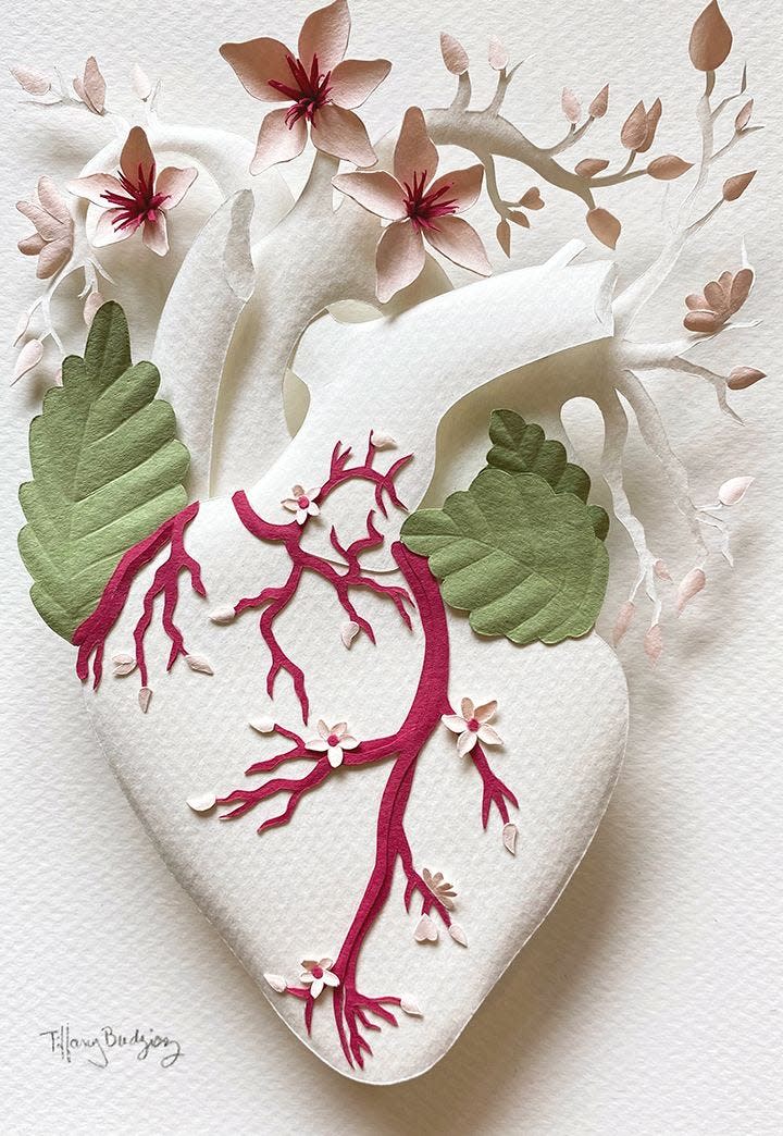 The Hearts & Healing series at UPMC Jameson features several small, dimensional anatomical hearts dressed with different combinations of greenery and flowers to symbolize love, growth, and renewal.