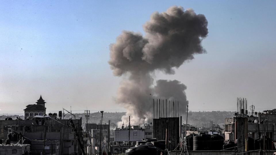 PHOTO: Smoke rises following Israeli air strikes on Al-Jeneina and Al-Salam neighbourhoods in Rafah, on May 8, 2024. (Abed Rahim Khatib/picture-alliance via dpa via AP)