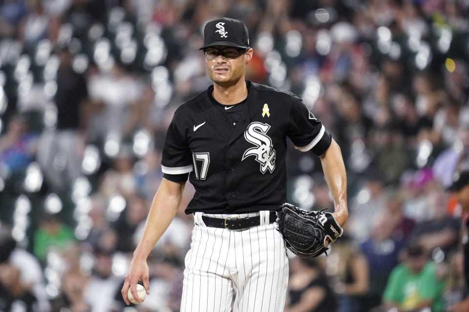 Chicago White Sox starting pitcher Joe Kelly looks at third base during the first inning of the team's baseball game against the Minnesota Twins in Chicago, Friday, Sept. 2, 2022. (AP Photo/Nam Y. Huh)