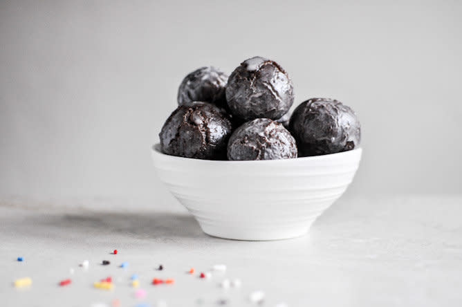 <strong>Get the <a href="http://www.howsweeteats.com/2012/09/glazed-and-sprinkled-chocolate-cake-donut-holes/">Chocolate Cake Donut Holes recipe</a> from How Sweet It Is</strong>