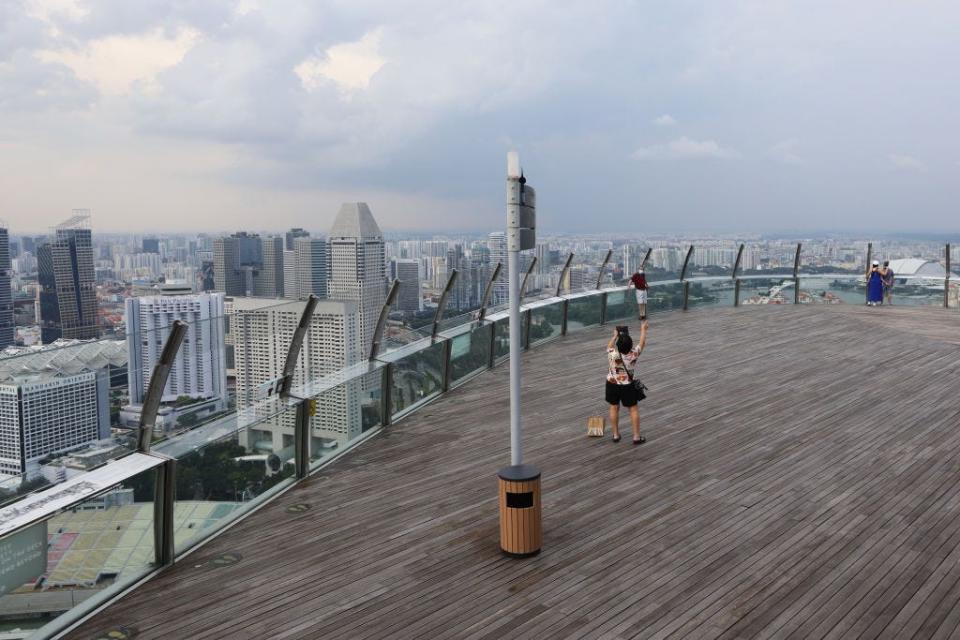 A woman at the Marina Sands Sky Park Observation Deck