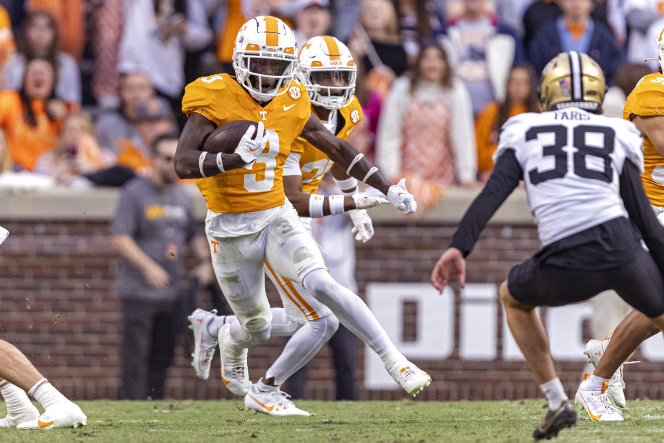 Tennessee defensive back Dee Williams (3) returns a kick during the first half of an NCAA college football game against Vanderbilt Saturday, Nov. 25, 2023, in Knoxville, Tenn. (AP Photo/Wade Payne)