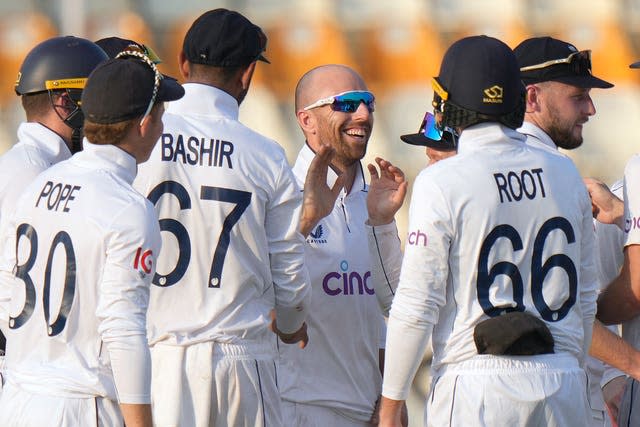 England’s Jack Leach, centre, celebrates with team-mates after the dismissal of Pakistan’s Saud Shakeel 