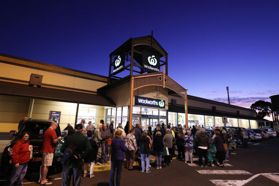 General view outside a Woolworths in Sunbury as people wait outside on March 17, 2020.