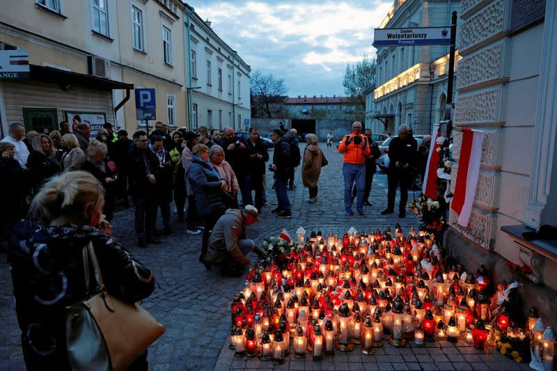 Mourners gather to hold a vigil for the Polish aid worker Damian Sobol who was killed by the Israeli army in Gaza, in Przemysl