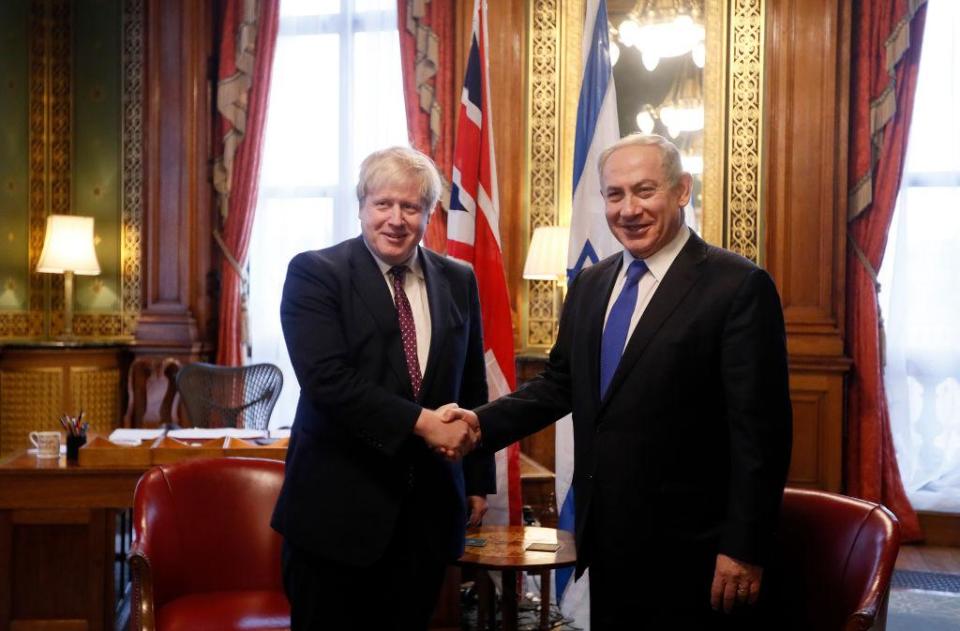 Boris Johnson (then foreign secretary) greets Benjamin Netanyahu at the Foreign Office in February 2017: Getty