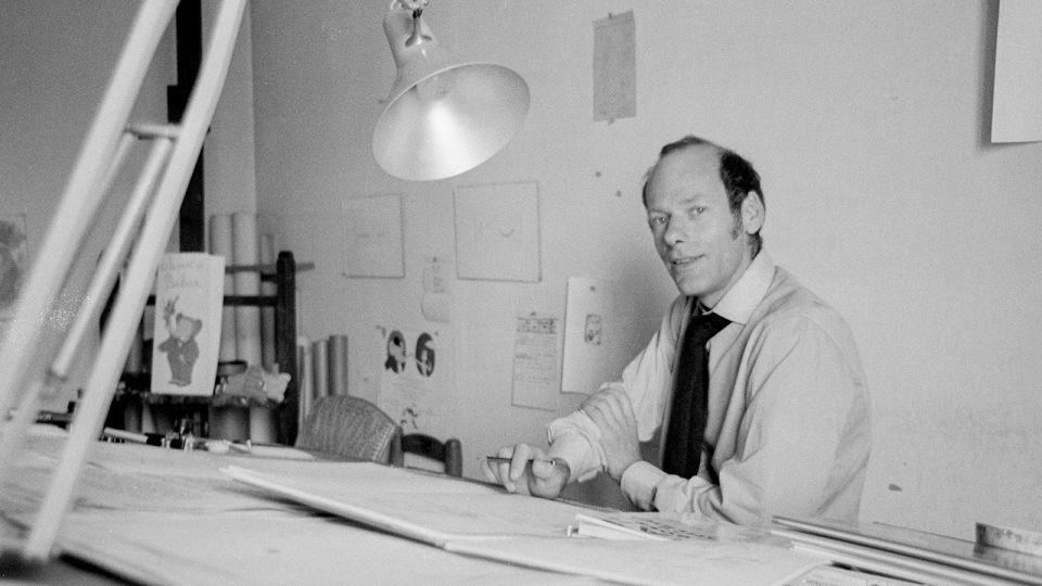 Children's author and illustrator Laurent de Brunhoff working at his home during a BBC television interview in 1969. - Malcolm Winton/Radio Times/Getty Images