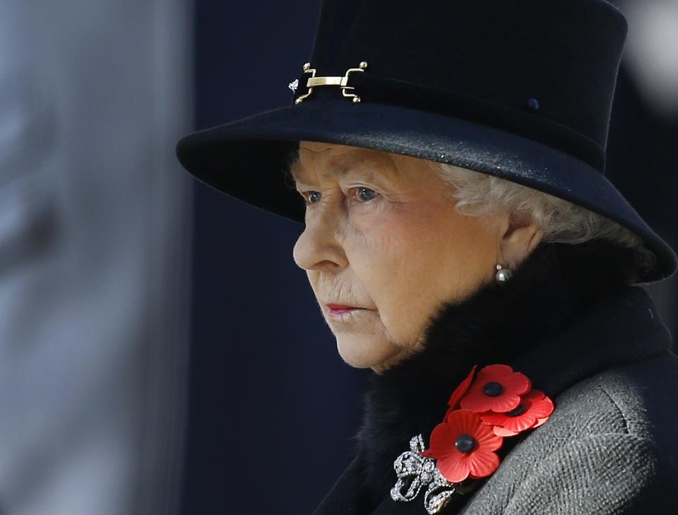 FILE - This is a Sunday, Nov. 10, 2013 file photo of Britain's Queen Elizabeth II as she listens during the service of remembrance at the Cenotaph in Whitehall, London. A monarch's life is not all luxury and glamour. A report by British lawmakers into the finances of Queen Elizabeth II has exposed crumbling palaces and depleted coffers, and discovered that a royal reserve fund for emergencies is down to its last million pounds ($1.6 million). In the Tuesday Jan. 28, 2014, report the legislators urged royal officials to adopt a more commercial approach to making money, and suggested opening up Buckingham Palace to visitors more often. (AP Photo/Kirsty Wigglesworth)