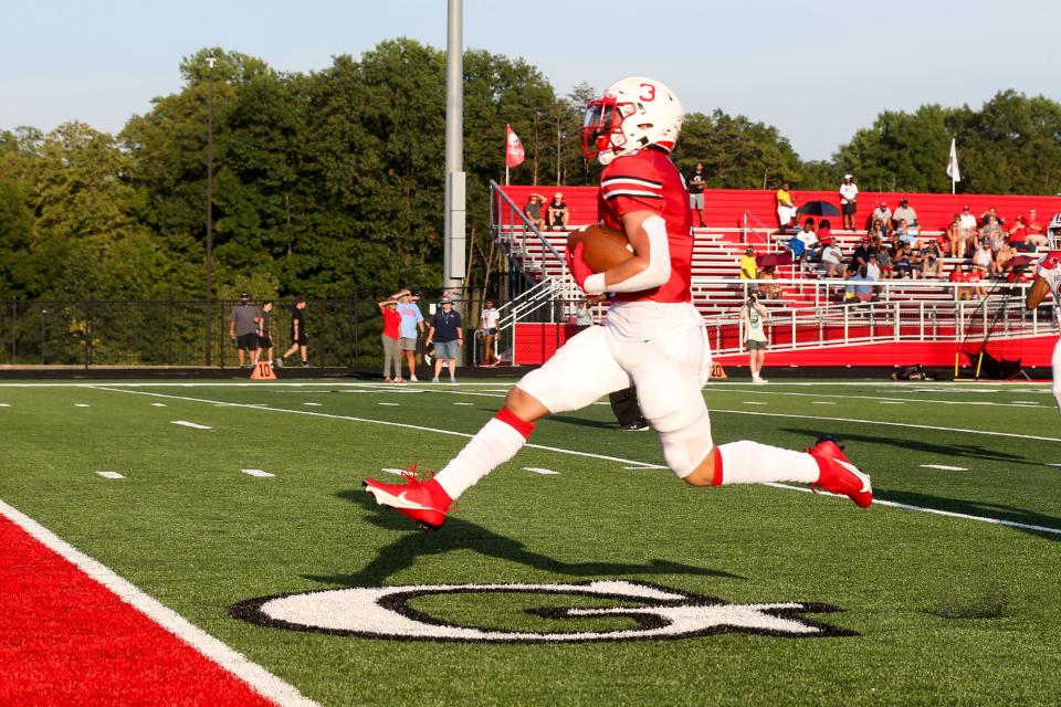 Center Grove's Noah Coy (3) with a pass reception and sprint over the goal line for 6 points during Center Grove vs Oakland (Tenn) high school varsity football, Aug 25, 2023; Greenwood, IN, USA; at Center Grove High School.