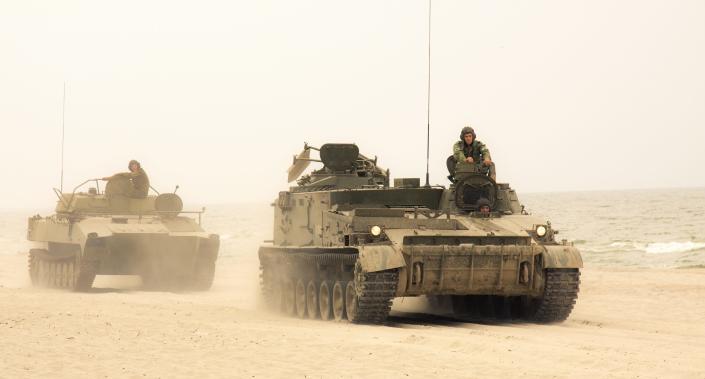 Russian tanks convoy on military maneuvers.