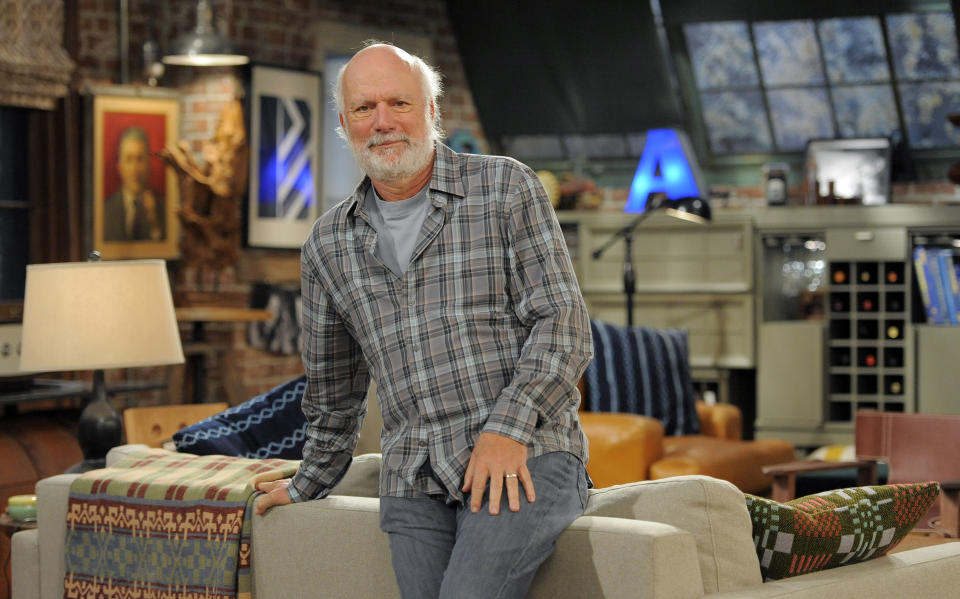 FILE - James Burrows, director of the television series "Partners," poses for a portrait on the set of the show at Warner Bros. Studios in Burbank, Calif., on Sept. 19, 2012. Burrows, who has directed hit comedies including "Taxi", "Friends," "Cheers" and "Will & Grace" has written a new memoir called "Directed by James Burrows." (Photo by Chris Pizzello/Invision/AP, File)