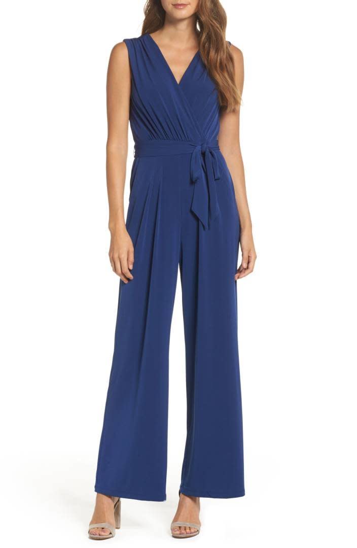 Get it on <a href="https://shop.nordstrom.com/s/vince-camuto-faux-wrap-jersey-jumpsuit-regular-petite/3706333?origin=coordinating-3706333-0-3-PDP_1-recbot-also_viewed2&amp;recs_placement=PDP_1&amp;recs_strategy=also_viewed2&amp;recs_source=recbot&amp;recs_page_type=product" target="_blank">Nordstrom for $98</a>.