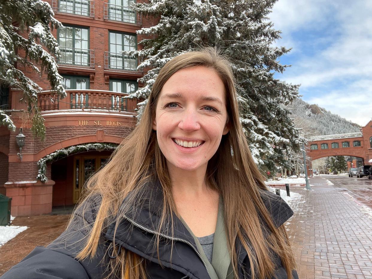 The author in front of The St. Regis Aspen Resort.