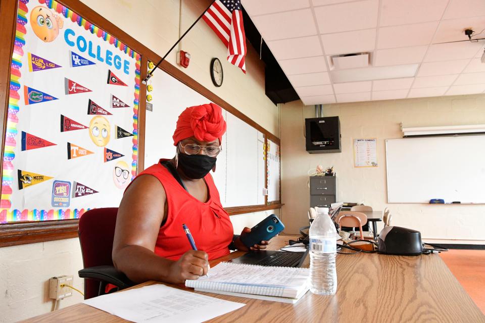 Andrea Kennedy prepares to have a virtual class with her seventh-grade students during the first day of school in Nashville this August.