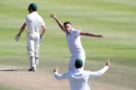 Cricket - South Africa vs Australia - Third Test - Newlands, Cape Town, South Africa - March 23, 2018 South Africa's Morne Morkel celebrates taking the wicket of Australia's Shaun Marsh. REUTERS/Mike Hutchings