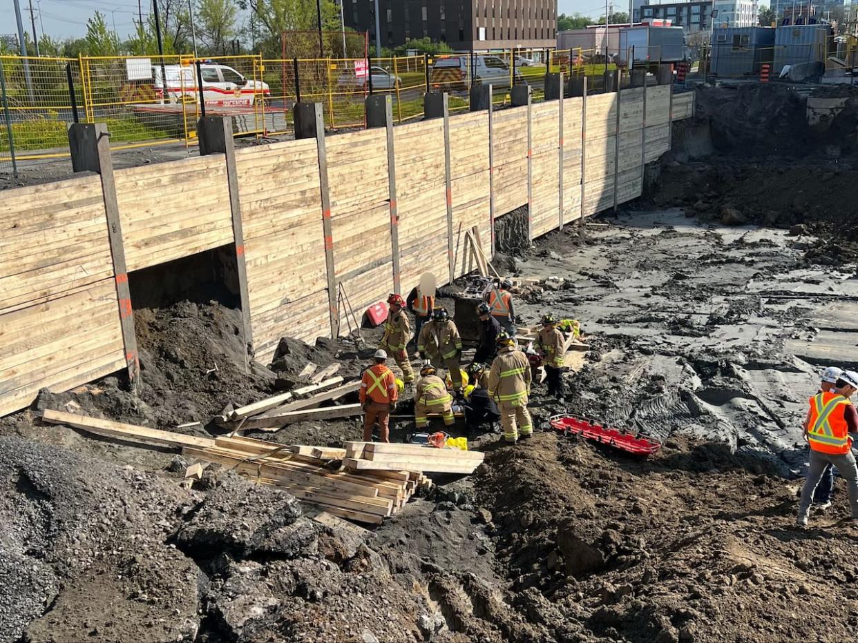 A worker was injured after part of a shoring wall collapsed at a construction site on Carling Avenue, near Westgate Shopping Centre, the morning of May 13, 2024. (Nick DeFazio/Ottawa Fire Services - image credit)