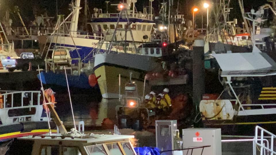 RNLI crews working to retrieve the pair on Monday night. (RNLI)