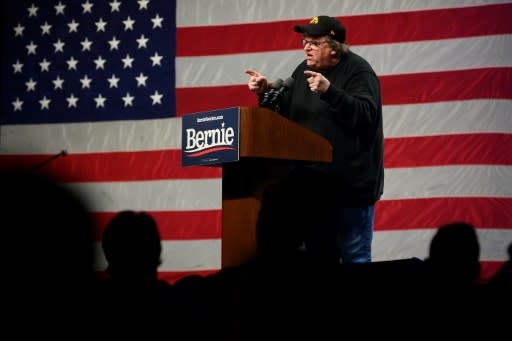 With presidential hopeful Senator Bernie Sanders stuck in Washington for the impeachment trial of President Donald Trump, filmmaker and activist Michael Moore stood in the candidate's place at a campaign event in Clive, Iowa