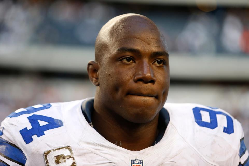 DeMarcus Ware walks off the field following an overtime win by the Cowboys over the Browns Sunday, Nov. 18, 2012, in Arlington, Texas.