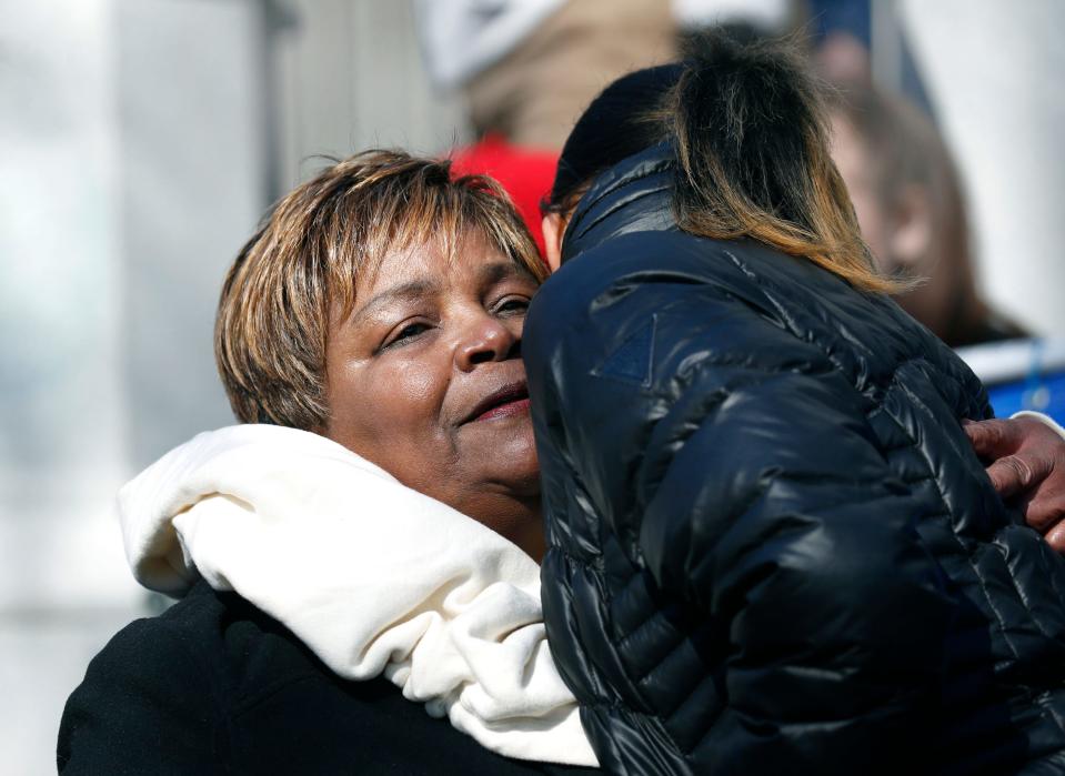 Lentory Johnson, whose son Johnny Ray Johnson was one of the victims in the triple homicide at the Boys & Girls Club of Rochester in 2015, gets a hug after her speech before the start of the Rochester March for Our Lives Rally starting at Washington Square Park in Rochester, New York. (Via OlyDrop)