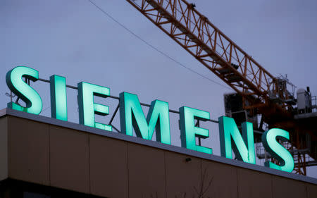 FILE PHOTO: The logo of German industrial group Siemens is seen in Zurich, Switzerland, January 30, 2019. REUTERS/Arnd Wiegmann