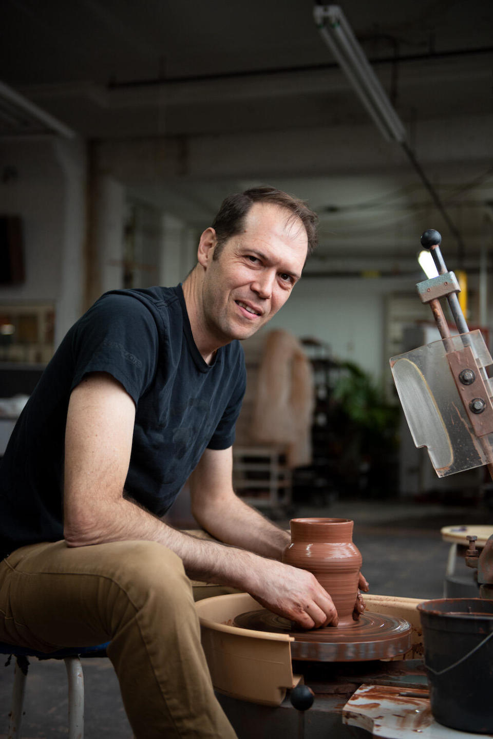 Jono Pandolfi at the pottery wheel