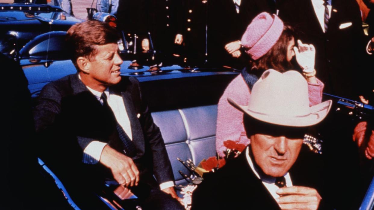 john and jackie kennedy with john connally in automobile