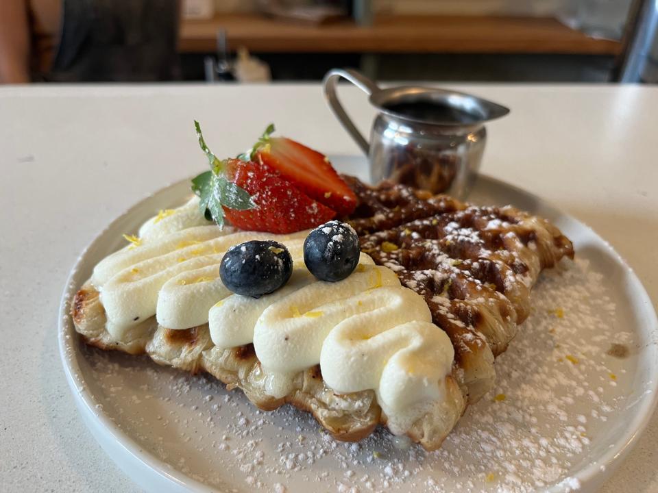 The creative Croffle, a croissant waffle topped with mascarpone cheese and fresh fruit provides an upscale mashup that's pleasing to the palate on August Sage Cafe & Lounge at The Factory at Columbia in Columbia, Tenn. on Jan, 28, 2024.