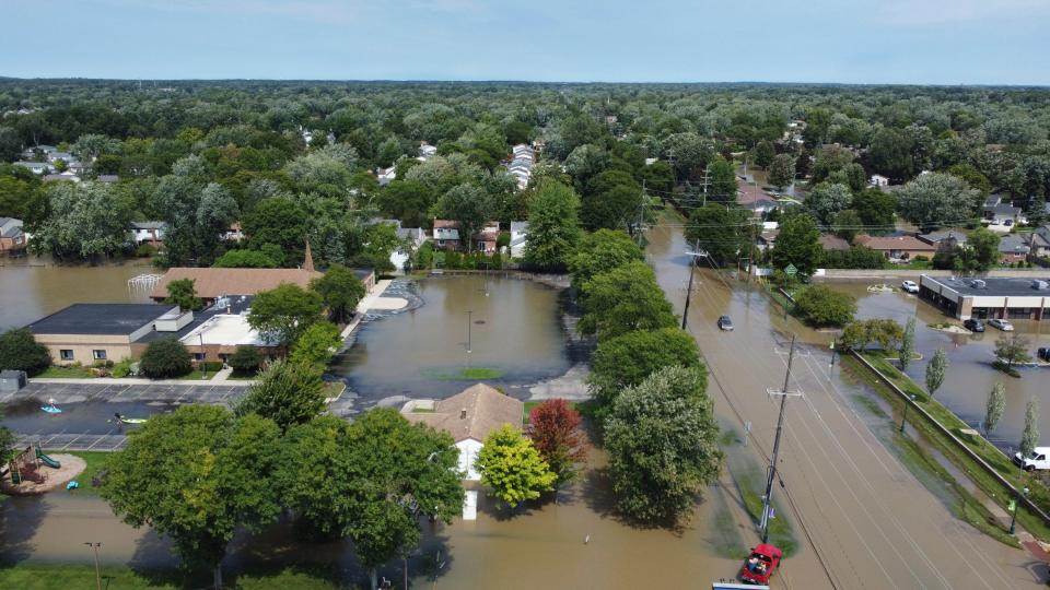 After hammering rains, Sheldon Road in Canton at Ford Road sustained flooding around major shopping stores and neighborhoods including Kohl's at New Towne Center on Thursday, Aug. 24, 2023.