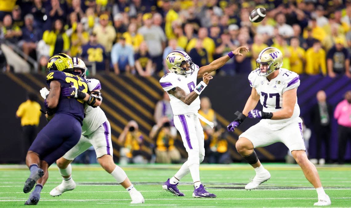 Washington Huskies quarterback Michael Penix Jr. (9) throws the ball during the third quarter of the College Football Playoff National Championship game against the Michigan Wolverines at NRG Stadium on Monday, Jan. 8, 2024, in Houston. Brian Hayes/bhayes@thenewstribune.com