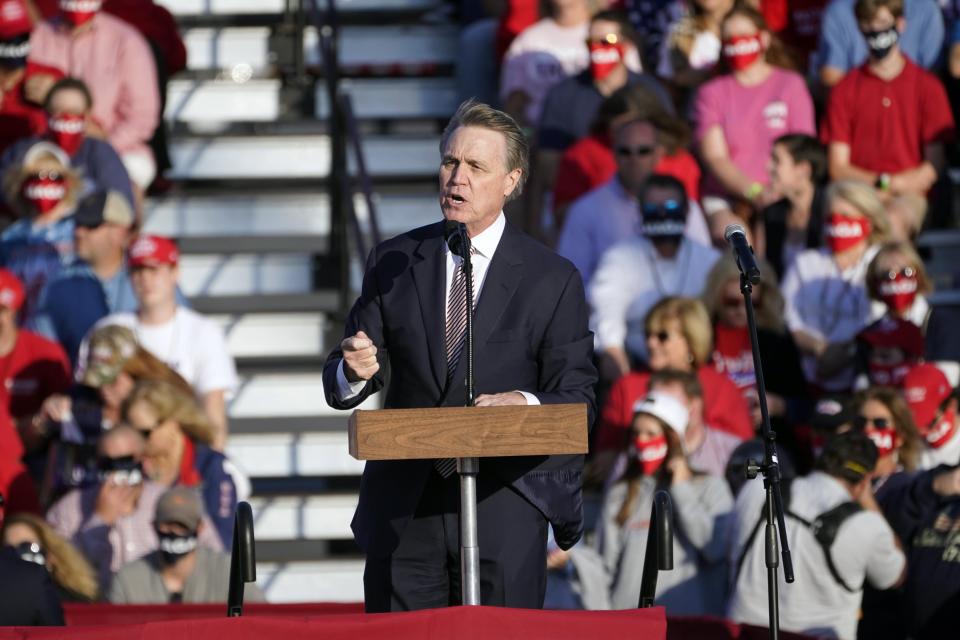 Sen. David Perdue, R-Ga., speaks during a campaign rally for President Donald Trump at Middle Georgia Regional Airport, Friday, Oct. 16, 2020, in Macon, Ga.