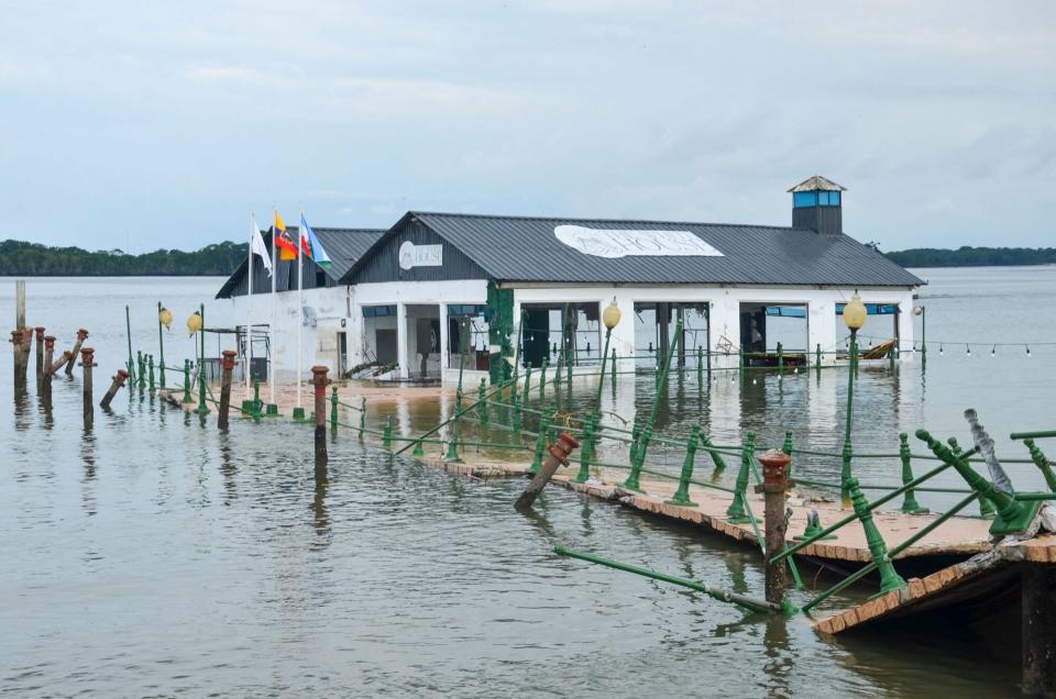 View of a dock destroyed by an earthquake in Puerto Bolivar, Machala, Ecuador, taken on March 19, 2023. - According to an official toll on Sunday, the death toll for a 6.5 magnitude earthquake in Ecuador and Peru rose to 15. Saturday's quake, whose epicentre was in the Ecuadoran municipality of Balao, near the border with Peru, left 14 dead in the southwestern provinces of El Oro and Azuay. (Photo by Ariel SUAREZ / AFP) (Photo by ARIEL SUAREZ/AFP via Getty Images)