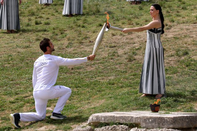 <p>Socrates Baltagiannis/picture alliance via Getty </p> Stefanos Ntouskos (Left) and Mary Mina (R)