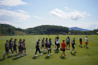 Members of the Cleveland Browns arrive at their team's NFL football training camp facility Saturday, July 22, 2023, in White Sulphur Springs, W.V. (AP Photo/Chris Carlson)