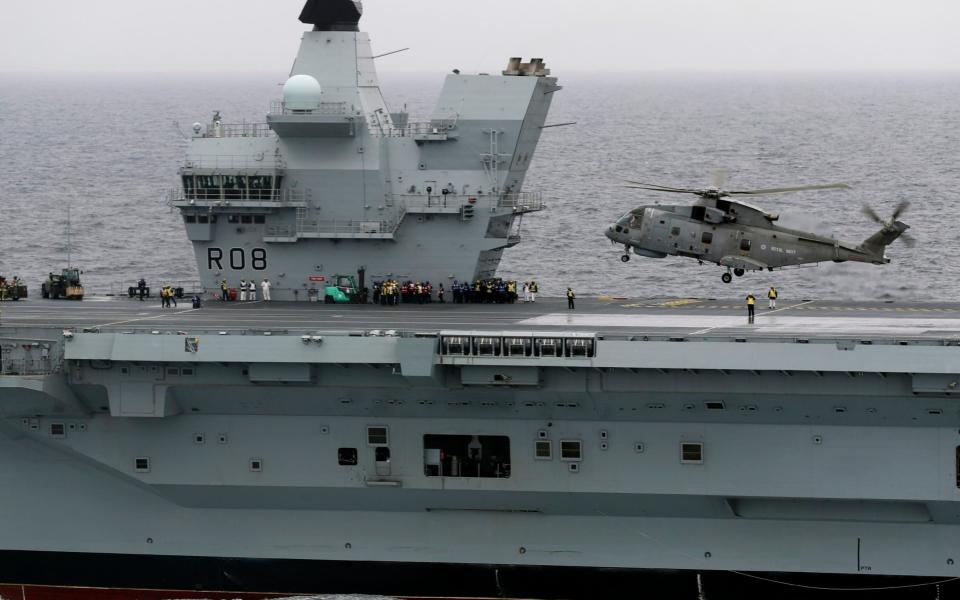 A Merlin helicopter from 820 Squadron based in RNAS Culdrose becomes the first aircraft to land on HMS Queen Elizabeth -  Royal Navy