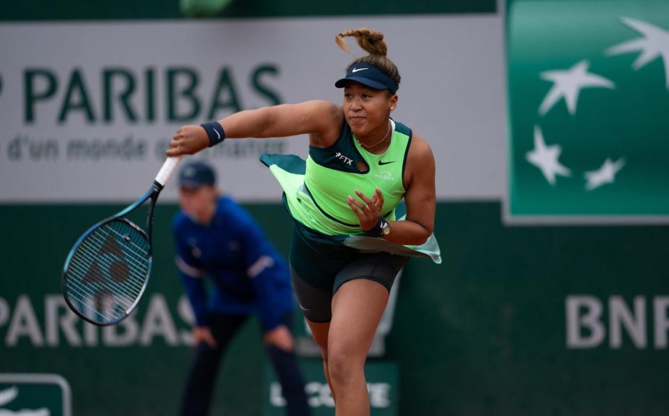 Naomi Osaka of Japan in action against Amanda Anisimova (not seen) of USA in the womenÃ¢s first round match during the French Open tennis tournament at Roland Ã¢Garros in Paris, France on May 23, 2022. - GETTY IMAGES