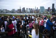 People attend a vigil for Avonte Oquendo, who is missing, in Queens, New York, October 11, 2013. According to family members, Oquendo, a 14-year-old mute and autistic child, was last seen at his Long Island City school in Queens on October 4. (REUTERS/Eduardo Munoz)