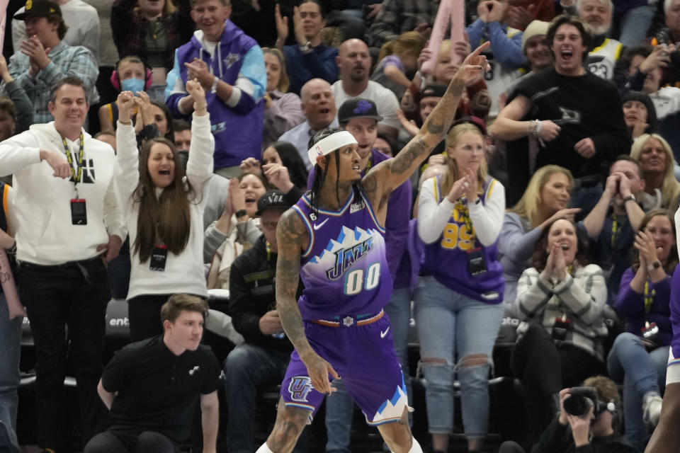 Utah Jazz guard Jordan Clarkson (00) celebrates after scoring against the Phoenix Suns during the second half of an NBA basketball game Friday, Nov. 18, 2022, in Salt Lake City. (AP Photo/Rick Bowmer)