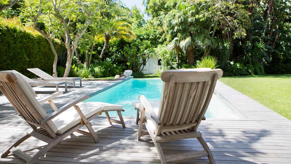  swimming pool with chairs 