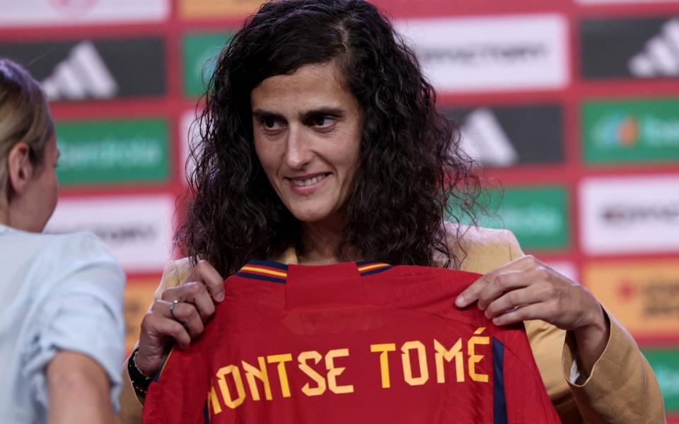 New coach of Spain's female football team Montse Tome poses with a jersey following a press conference at the Ciudad del Futbol training facilities in Las Rozas de Madrid on September 18, 2023, ahead of the UEFA Nations League football matches against Sweden and Switzerland. Spain won the Women's World Cup in August but the four weeks since have been filled with controversy and turmoil after former president Luis Rubiales forcibly kissed midfielder Jenni Hermoso